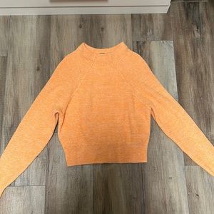 Orange free people mock neck sweater